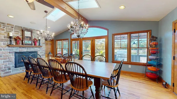 a living room with furniture fireplace and flat screen tv