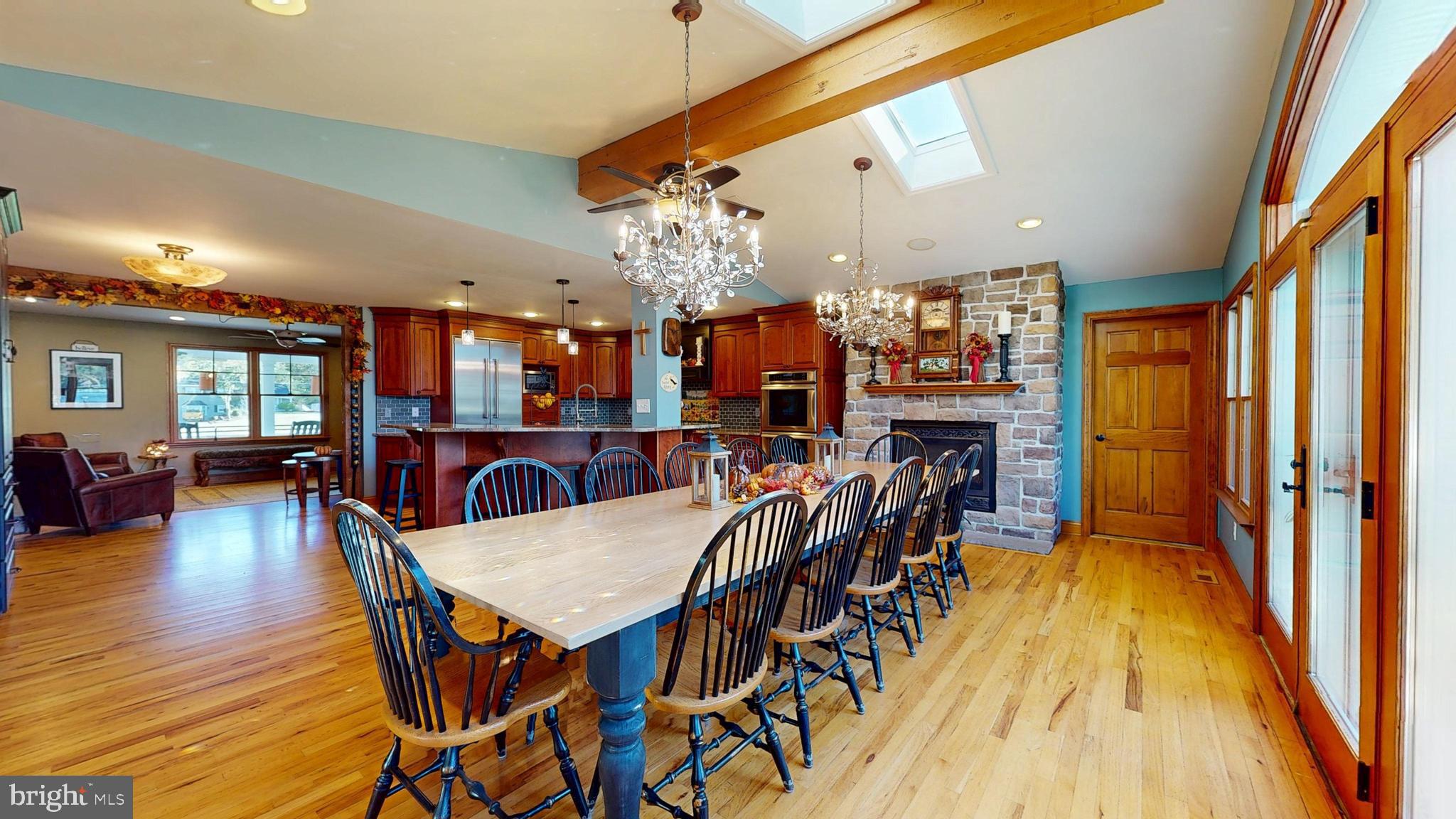 40 Cooper Tomlinson Road Medford, NJ 08055 - Photo 25 of 96 a view of a dining room with furniture and wooden floor