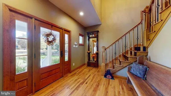 a view of a house with porch and wooden floor