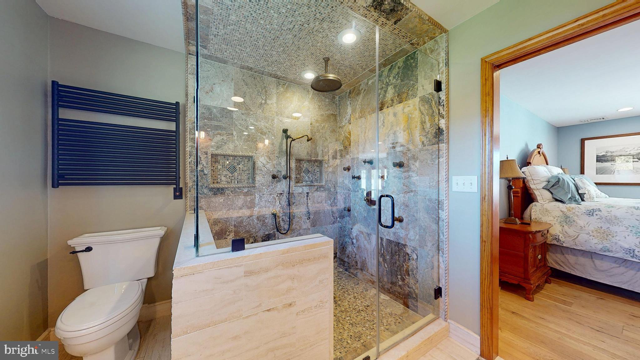 40 Cooper Tomlinson Road Medford, NJ 08055 - Photo 59 of 96 a bathroom with a sink a toilet and shower