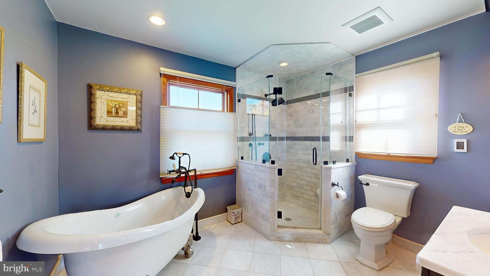 40 Cooper Tomlinson Road Medford, NJ 08055 - Photo 66 of 96 a bathroom with a granite countertop toilet sink and mirror