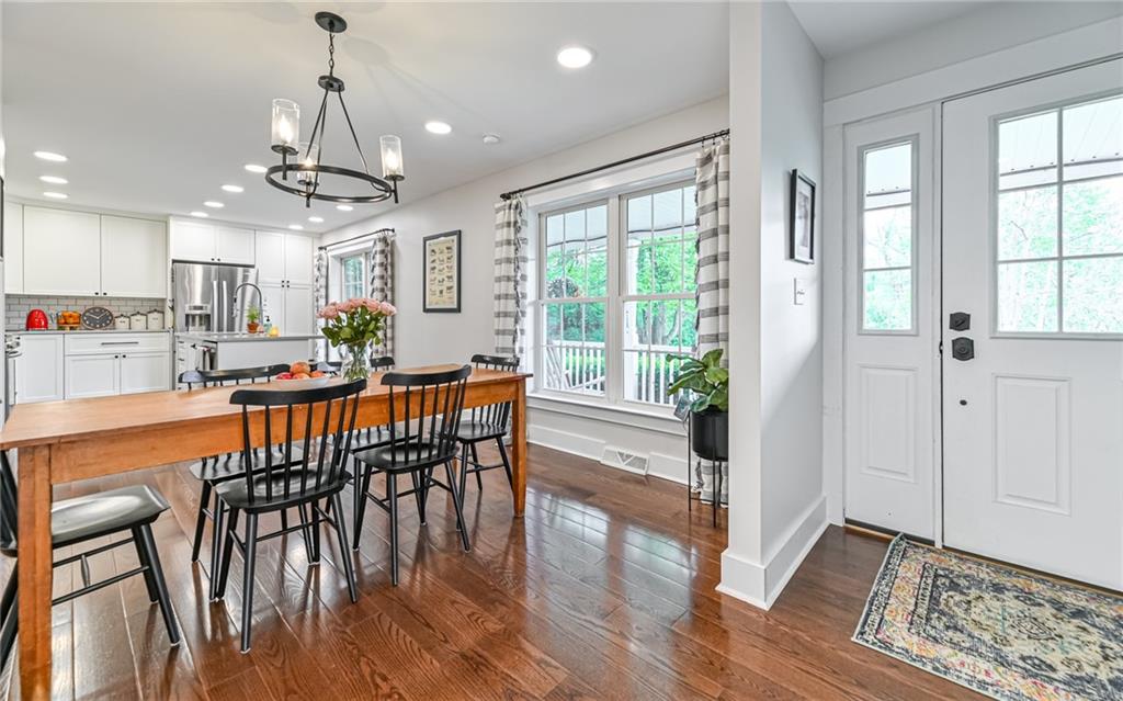 208 Middle Trail Butler, PA 16002 - Photo 4 of 25 a view of a dining room with furniture window and wooden floor