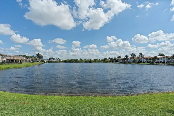 a view of a lake in middle of the house