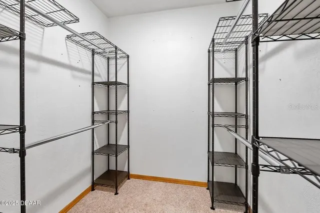 a view of staircase with a large window