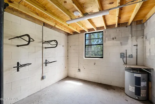 a view of a swimming pool with chairs