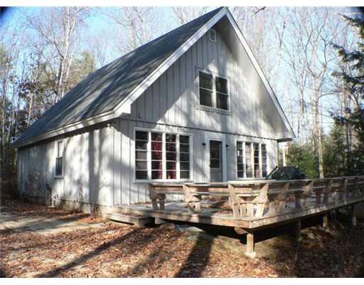 62 Stack Em Inn Moose Pond Bridgton, ME 04009 - Photo 2 of 8 Exterior Front. View from water