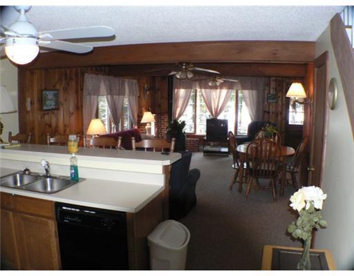 62 Stack Em Inn Moose Pond Bridgton, ME 04009 - Photo 4 of 8 Kitchen. open w/dining area & living...