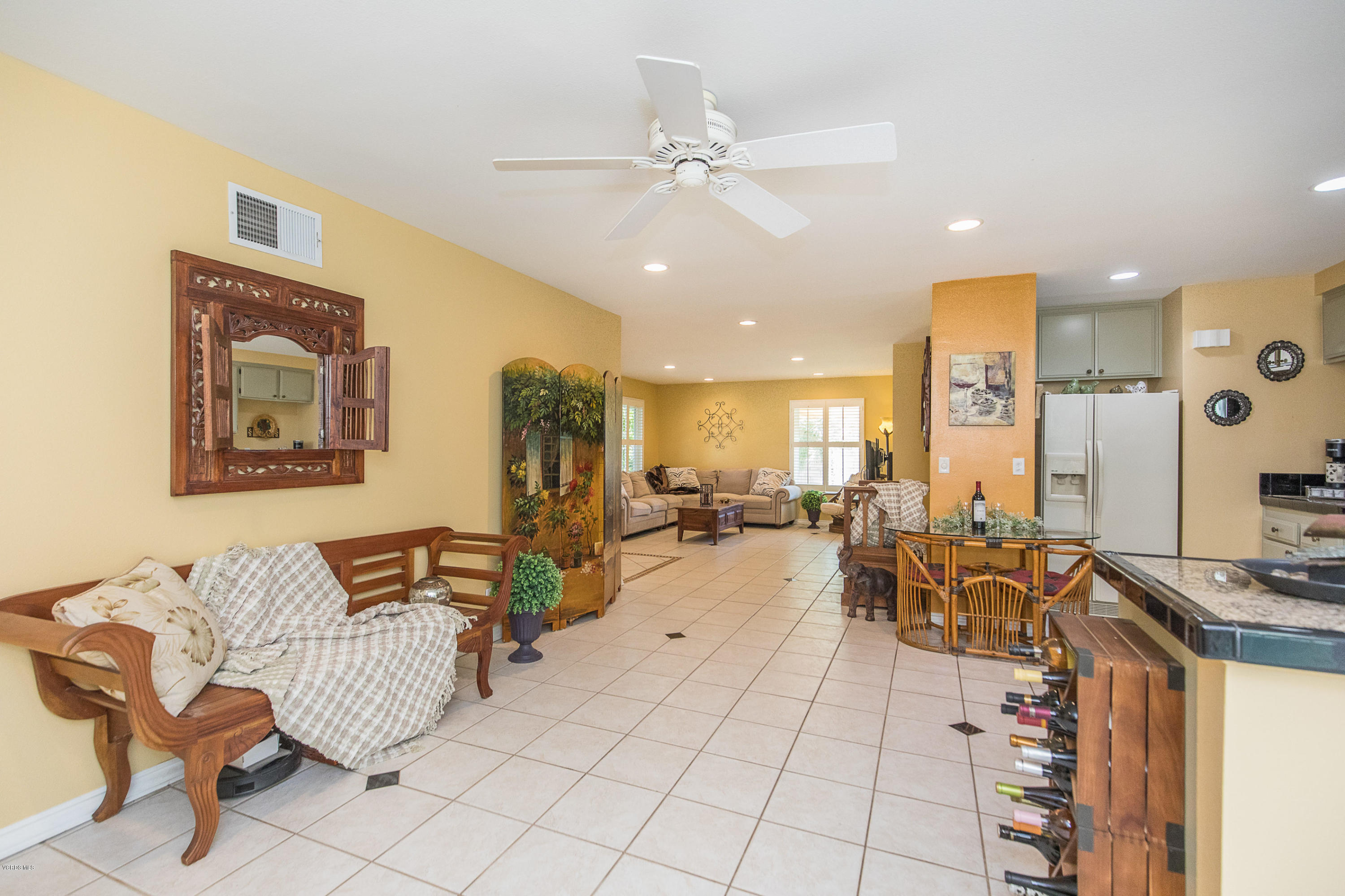13208 East Quail Summit Road Moorpark, CA 93021 - Photo 13 of 36 a living room with furniture and flat screen tv