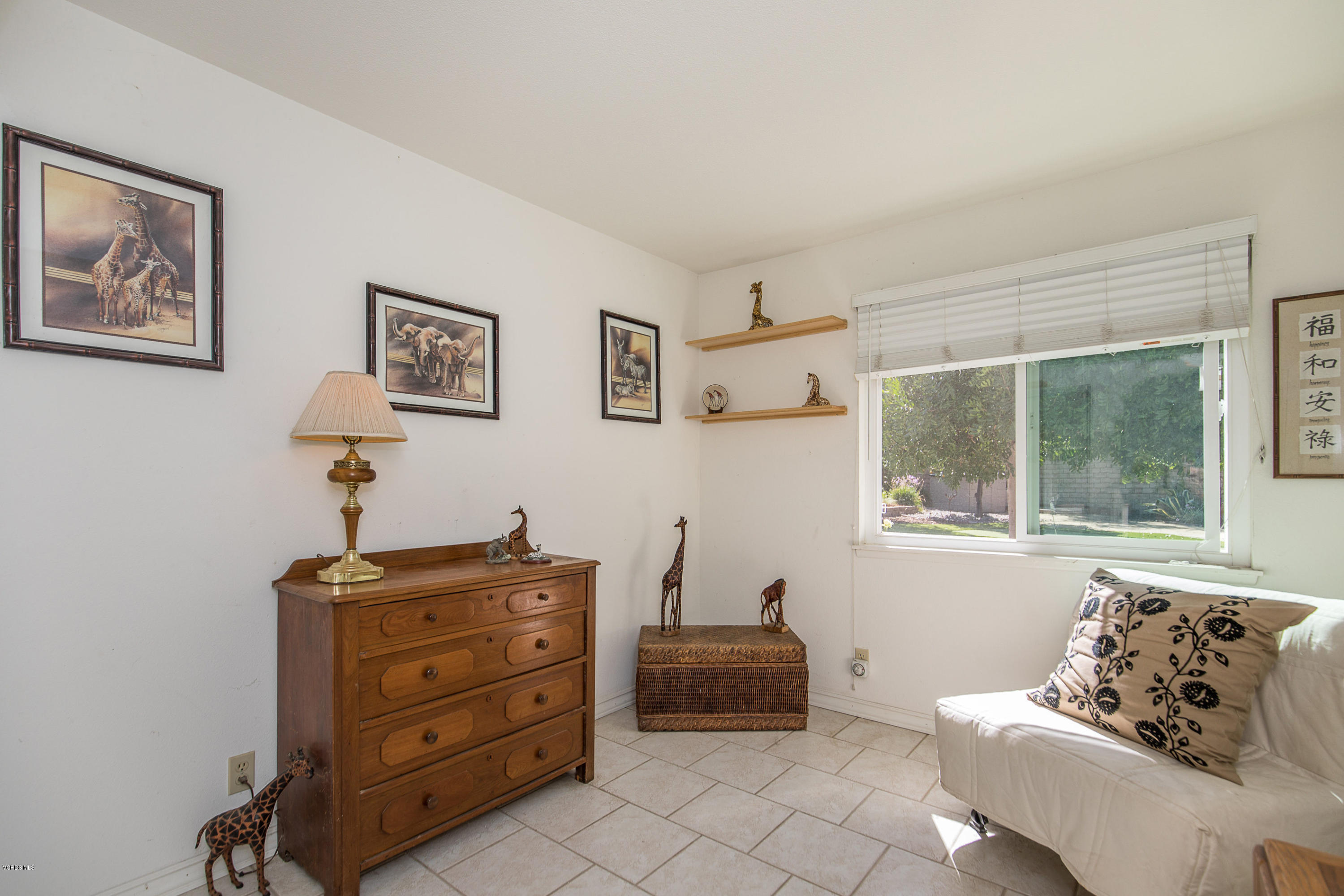 13208 East Quail Summit Road Moorpark, CA 93021 - Photo 15 of 36 a bedroom with furniture and windows