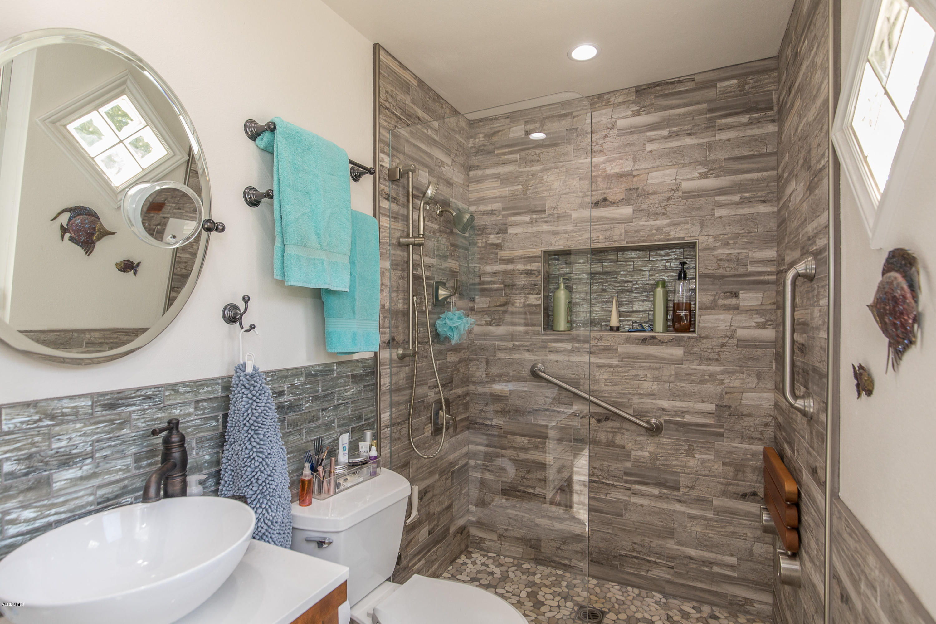 13208 East Quail Summit Road Moorpark, CA 93021 - Photo 18 of 36 a bathroom with a toilet sink and mirror