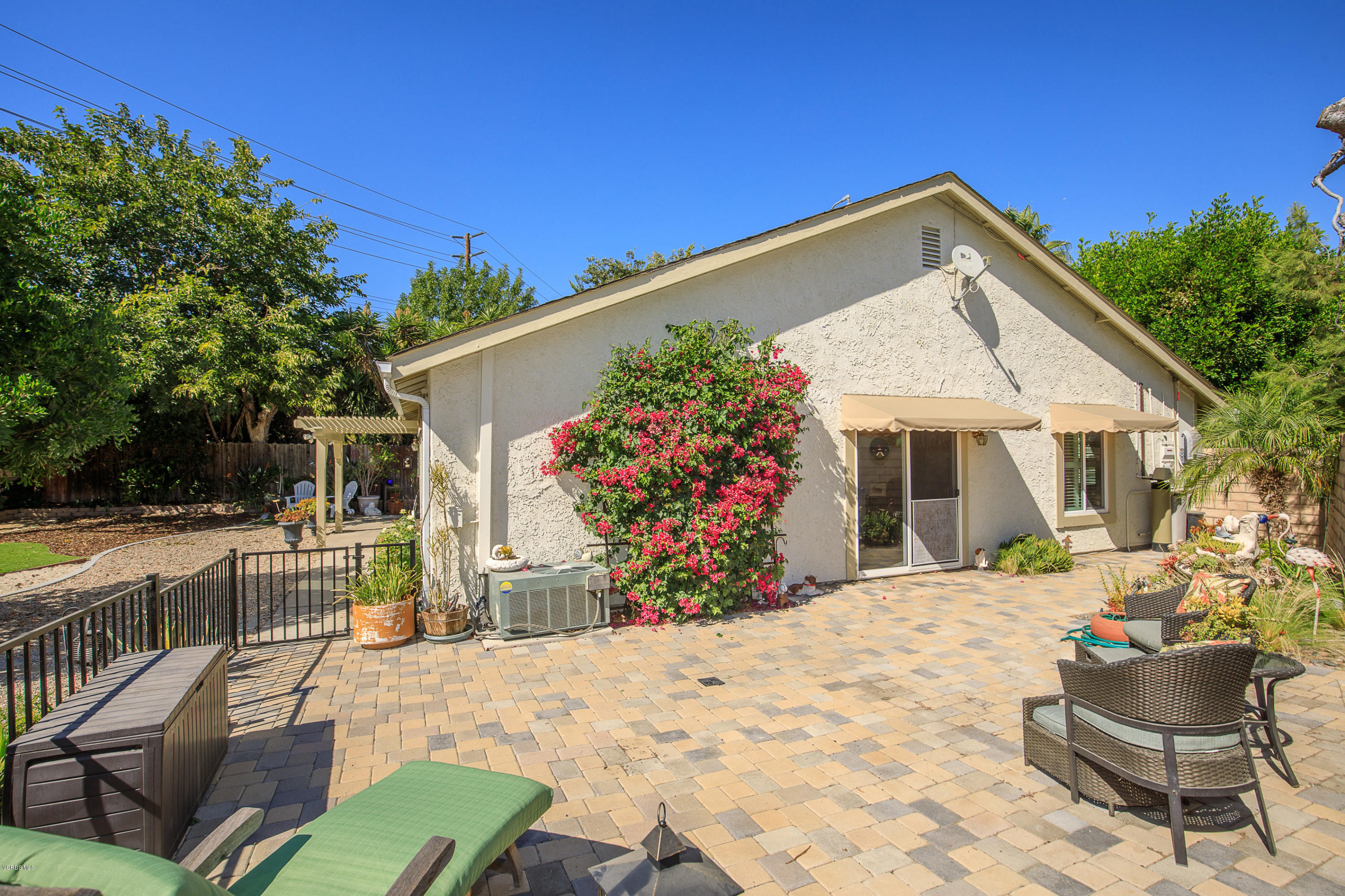 13208 East Quail Summit Road Moorpark, CA 93021 - Photo 28 of 36 a patio with a table and chairs and potted plants