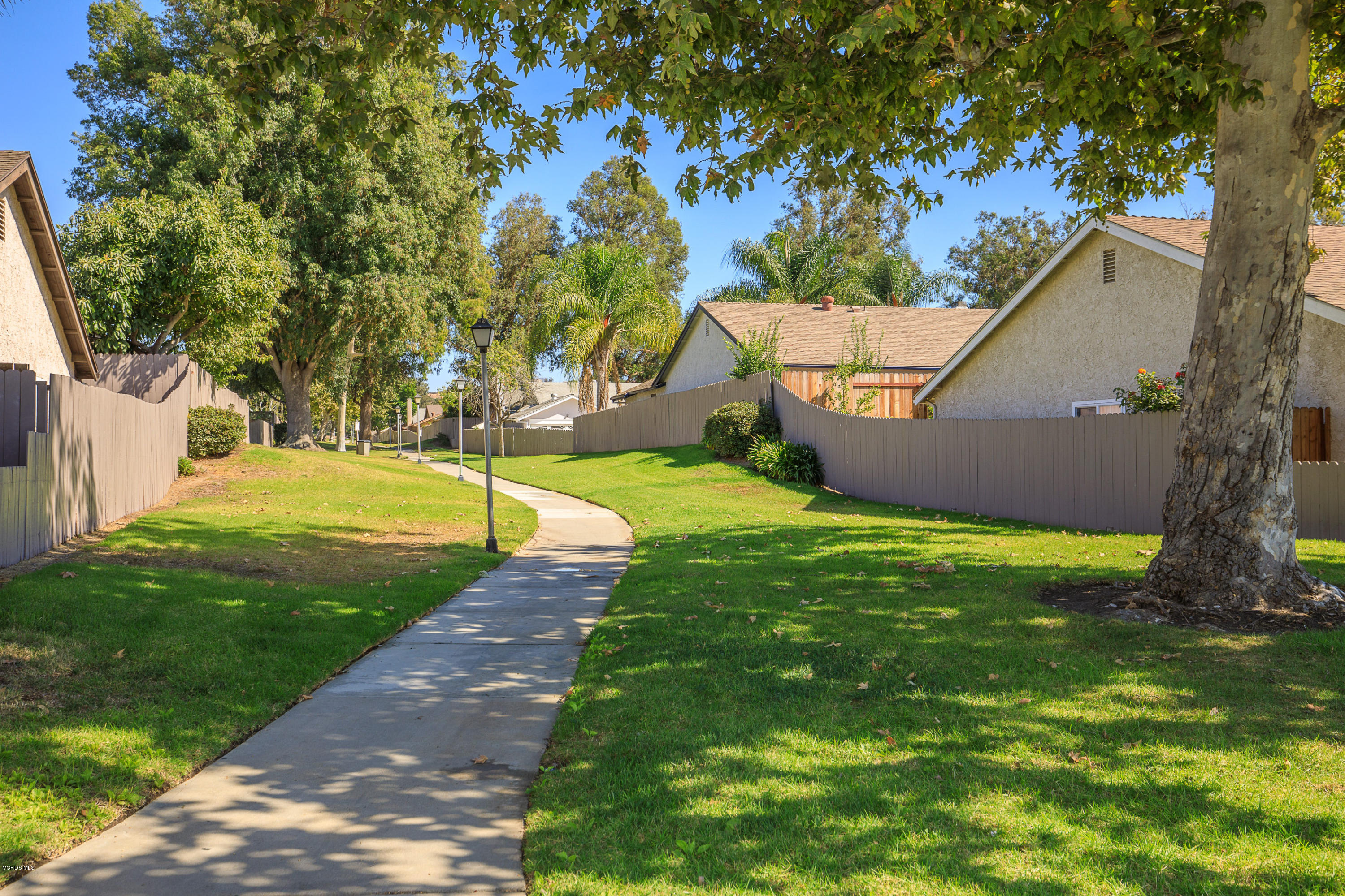 13208 East Quail Summit Road Moorpark, CA 93021 - Photo 31 of 36 a view of a house with a yard