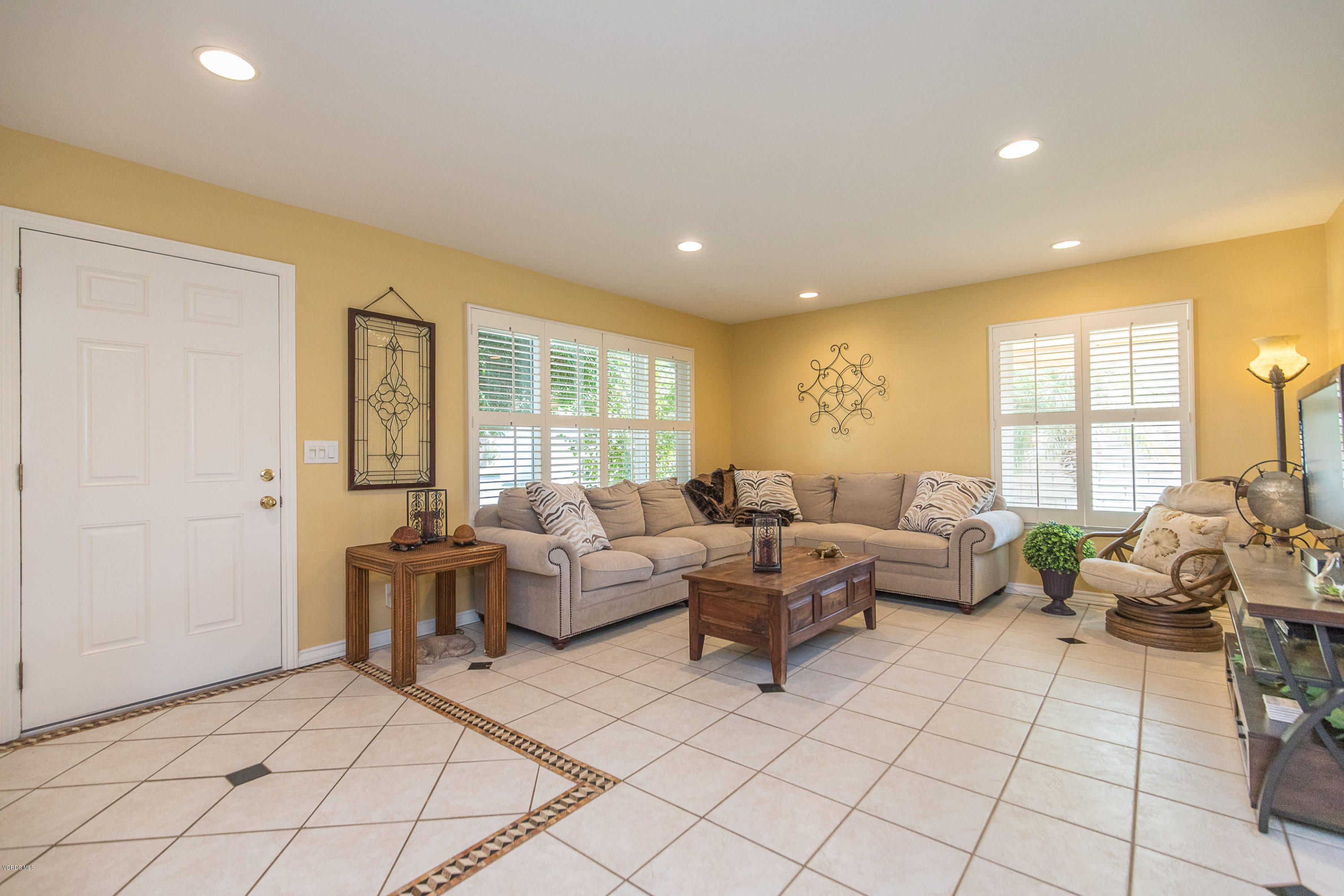 13208 East Quail Summit Road Moorpark, CA 93021 - Photo 5 of 36 a living room with furniture and a large window