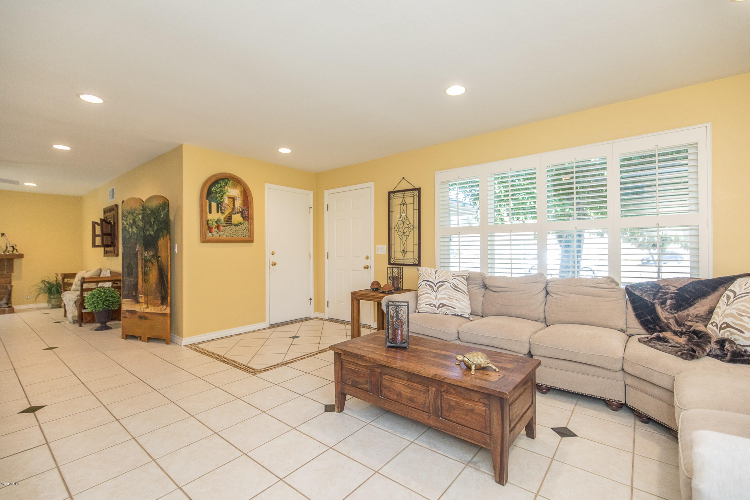 13208 East Quail Summit Road Moorpark, CA 93021 - Photo 6 of 36 a living room with furniture and large windows