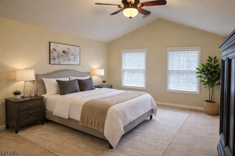 40 Helm's Mill Road Hackettstown, NJ 07840 - Photo 13 of 33 a bedroom with a bed and a chandelier