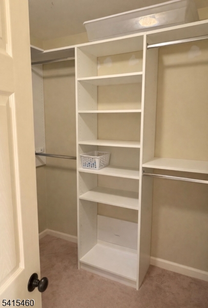 40 Helm's Mill Road Hackettstown, NJ 07840 - Photo 16 of 33 a view of walk in closet with empty racks