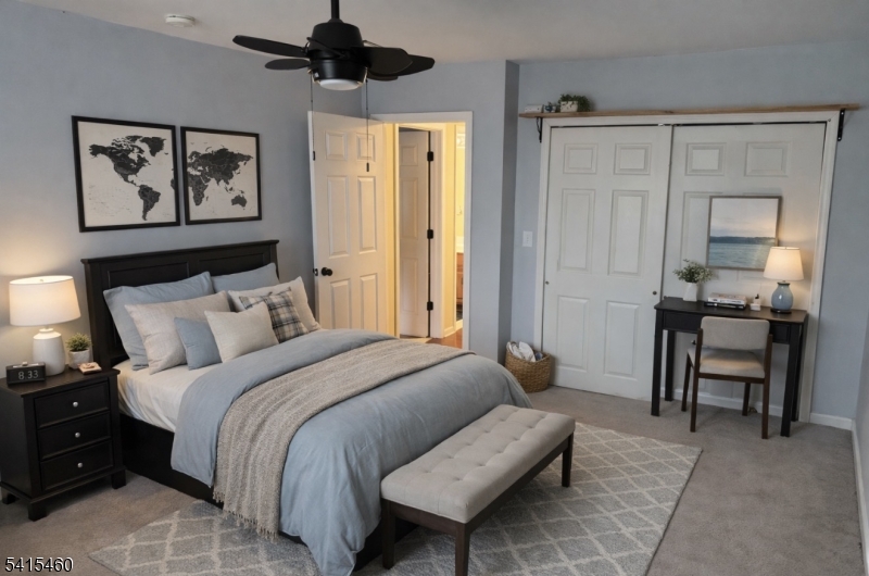 40 Helm's Mill Road Hackettstown, NJ 07840 - Photo 19 of 33 a bedroom with bed and a chandelier