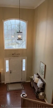 a living room with furniture and window