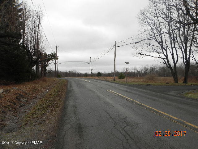 42 Knob Road Mount Pocono, PA 18344 - Photo 5 of 6 a view of a road with a yard