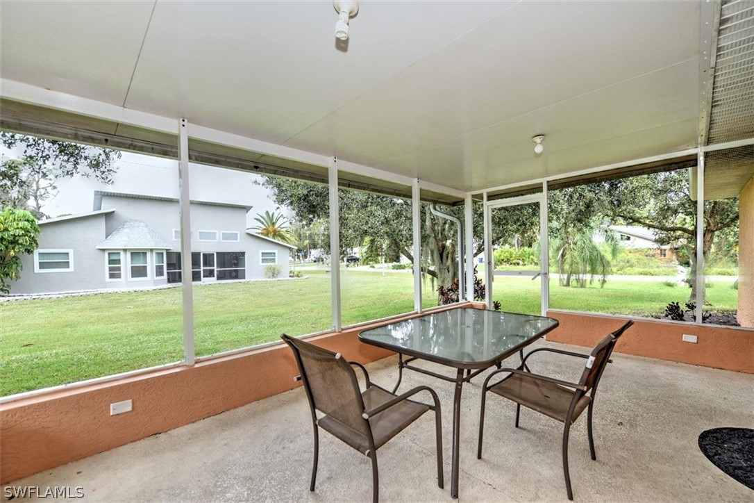 19004 Tangerine Road Fort Myers, FL 33967 - Photo 11 of 26 a view of a patio with table and chairs
