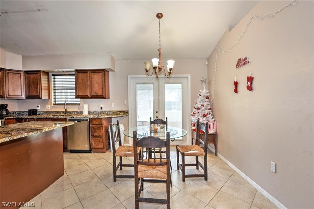 19004 Tangerine Road Fort Myers, FL 33967 - Photo 5 of 26 a view of a dining room with furniture and window