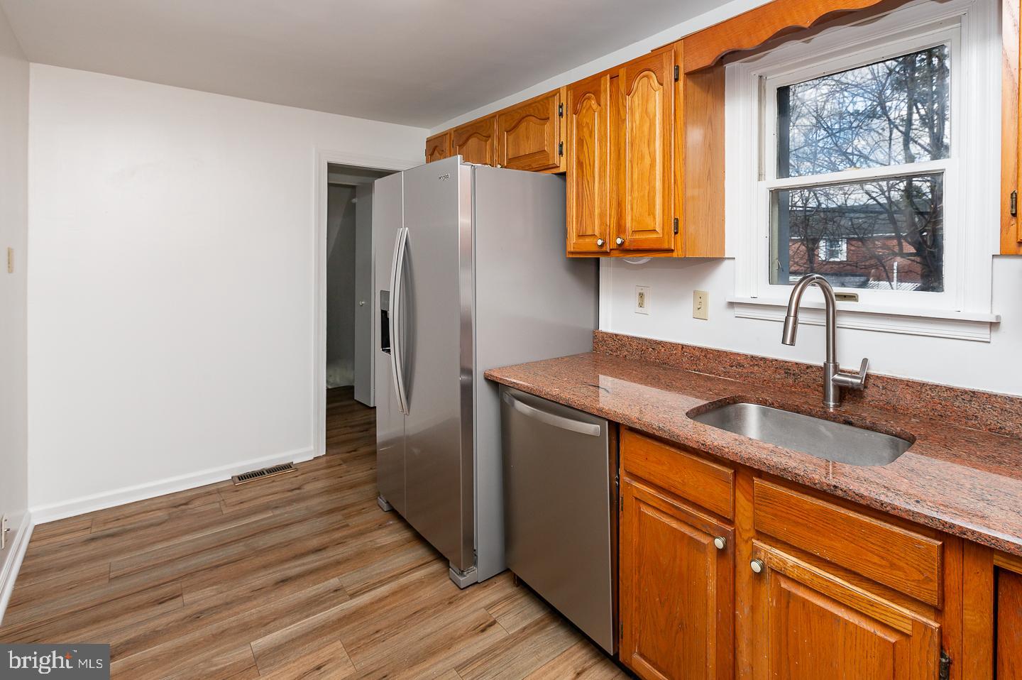 222 Pickwick Road Havertown, PA 19083 - Photo 14 of 39 a kitchen with granite countertop cabinets stainless steel appliances and a sink