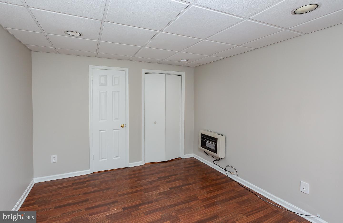 222 Pickwick Road Havertown, PA 19083 - Photo 15 of 39 a view of a livingroom with wooden floor and a ceiling fan