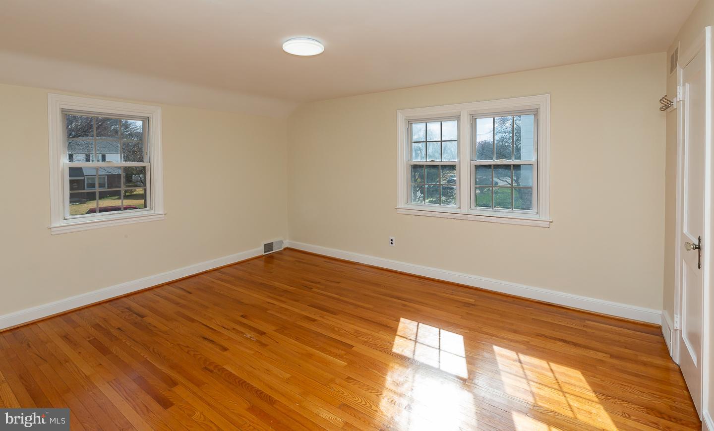 222 Pickwick Road Havertown, PA 19083 - Photo 22 of 39 a view of an empty room with a window