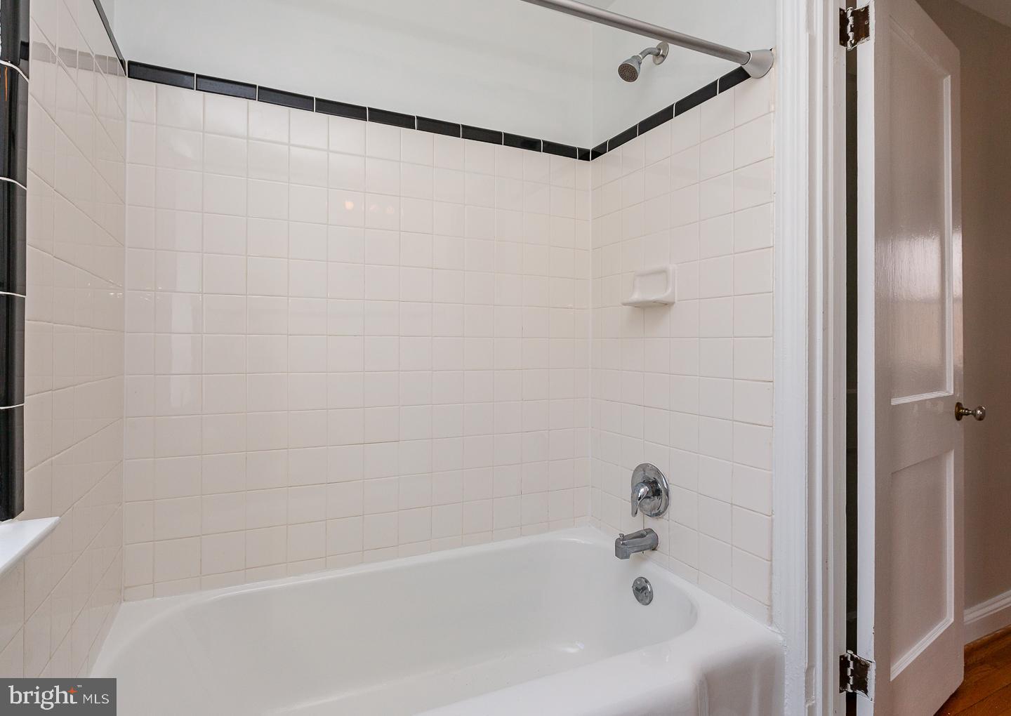 222 Pickwick Road Havertown, PA 19083 - Photo 28 of 39 a bathroom with a shower and a bath tub