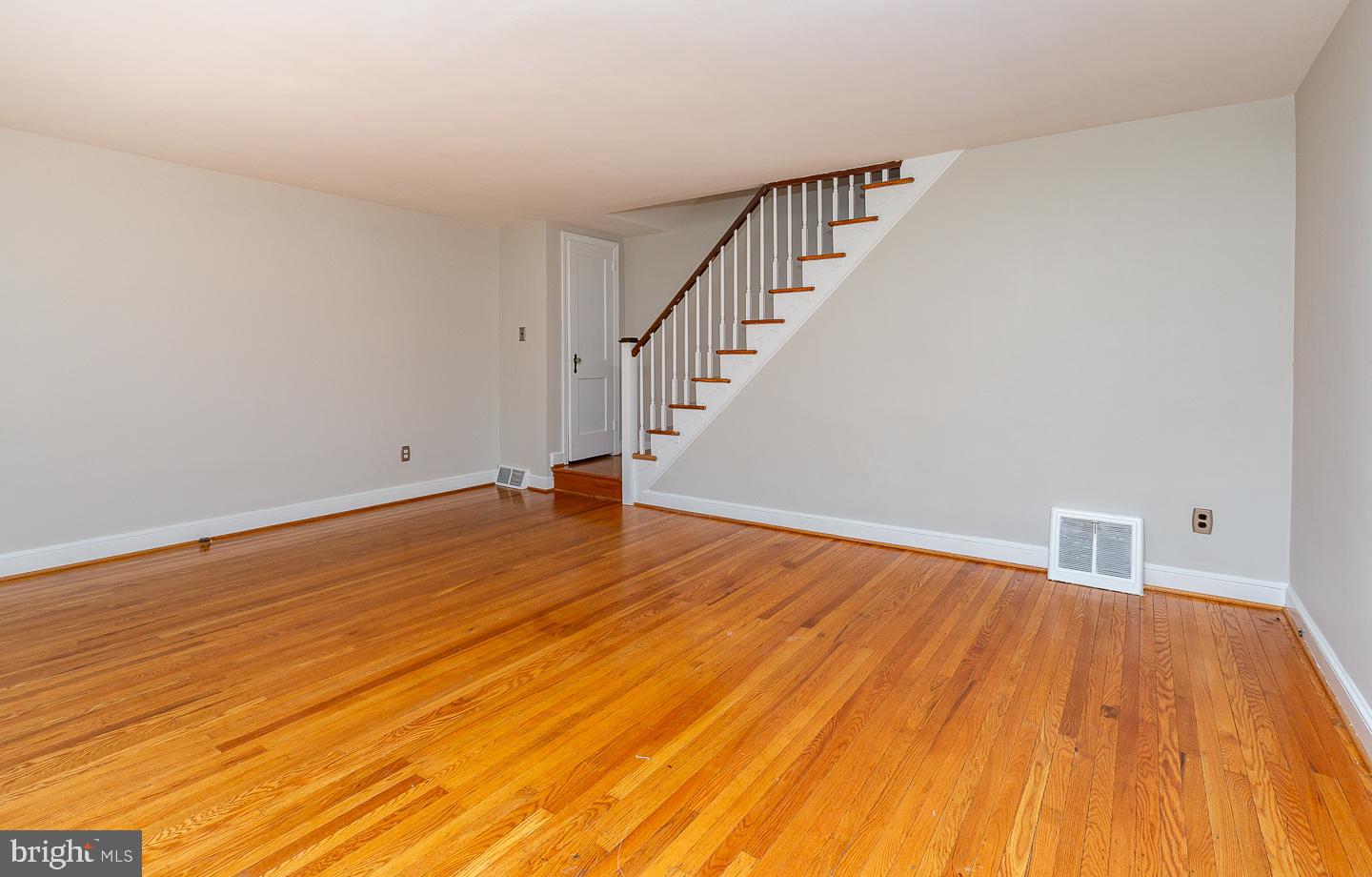 222 Pickwick Road Havertown, PA 19083 - Photo 4 of 39 a view of a room with wooden floor and white walls