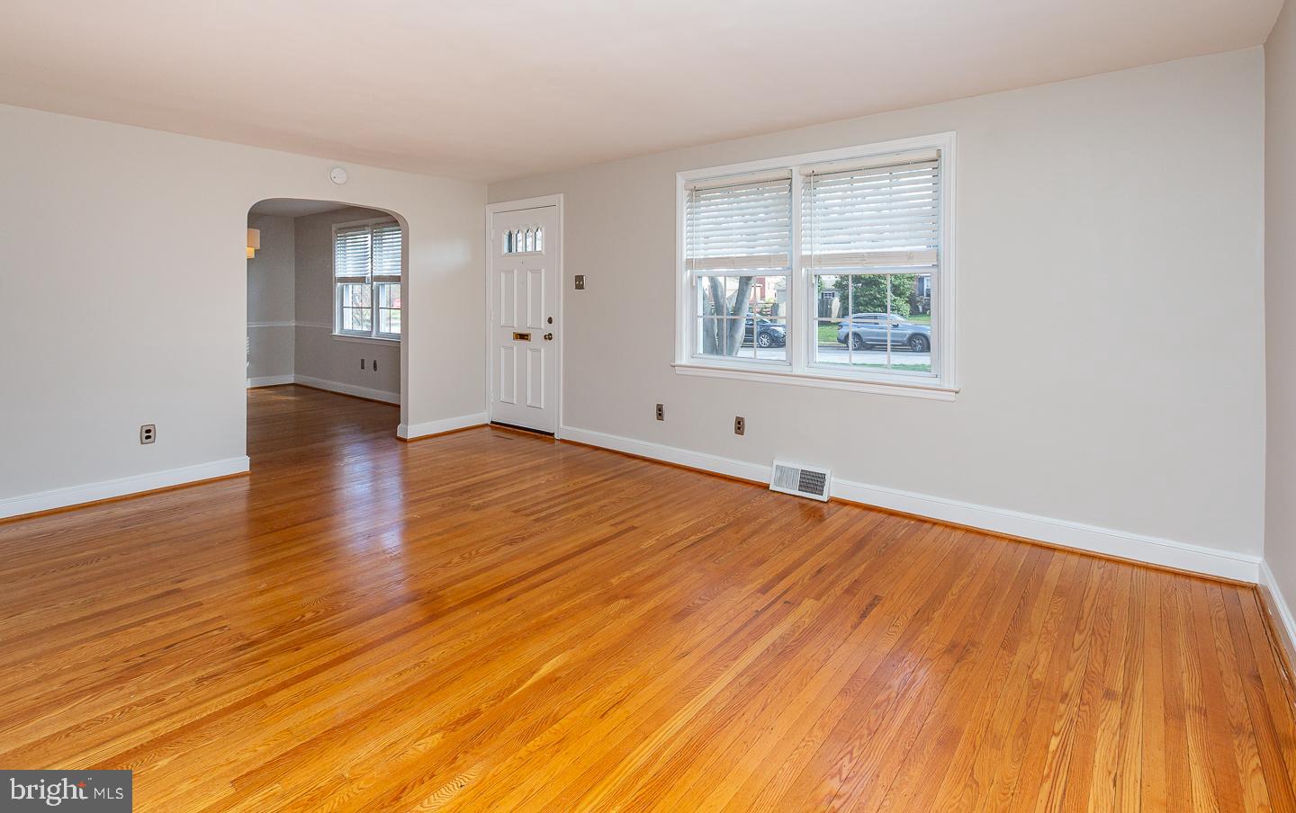 222 Pickwick Road Havertown, PA 19083 - Photo 6 of 39 an empty room with wooden floor and windows
