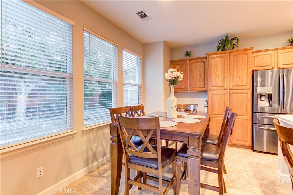 1941 Devaul Ranch Drive San Luis Obispo, CA 93405 - Photo 17 of 58 a dining room with furniture and large window