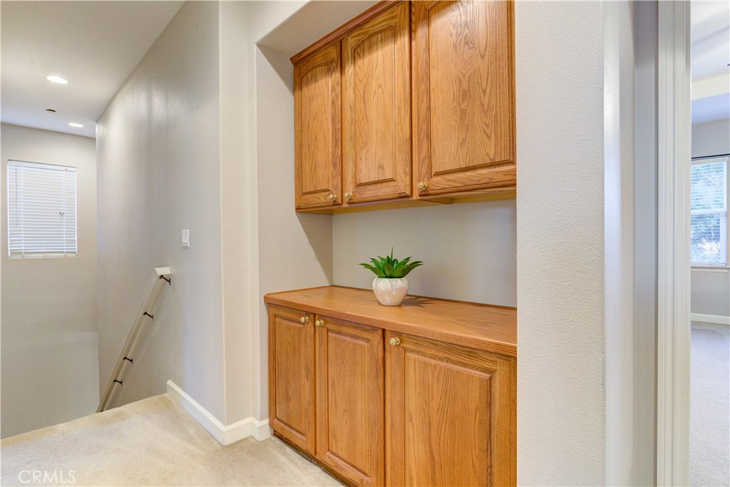 1941 Devaul Ranch Drive San Luis Obispo, CA 93405 - Photo 18 of 58 a bathroom with a sink a mirror and a window