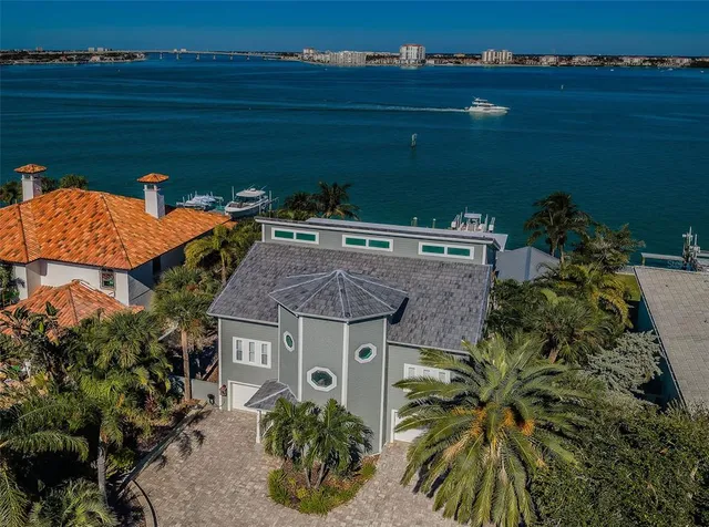 an aerial view of a house with outdoor space