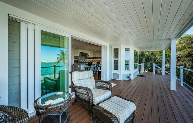 a view of a chairs and table on the terrace