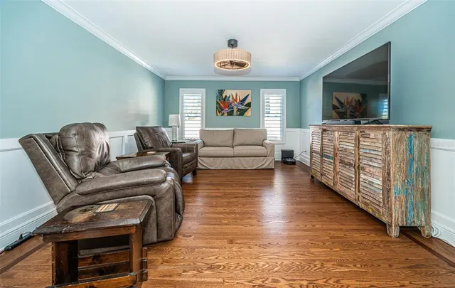 a view of an house with swimming pool and sitting space