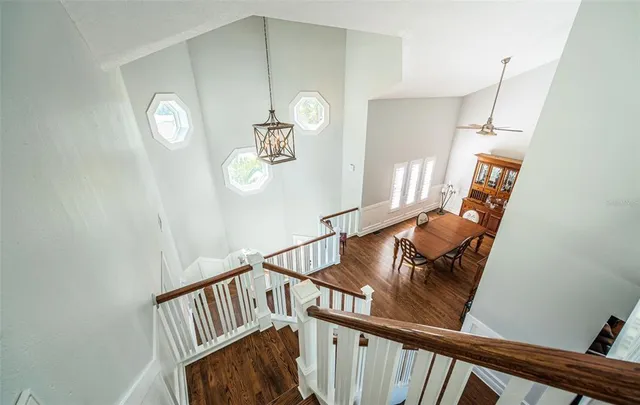 an aerial view of a house with a lake view