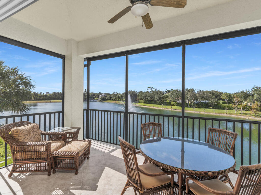 7869 Hawthorne, Unit 303 Naples, FL 34113 - Photo 19 of 52 a view of a balcony and chairs