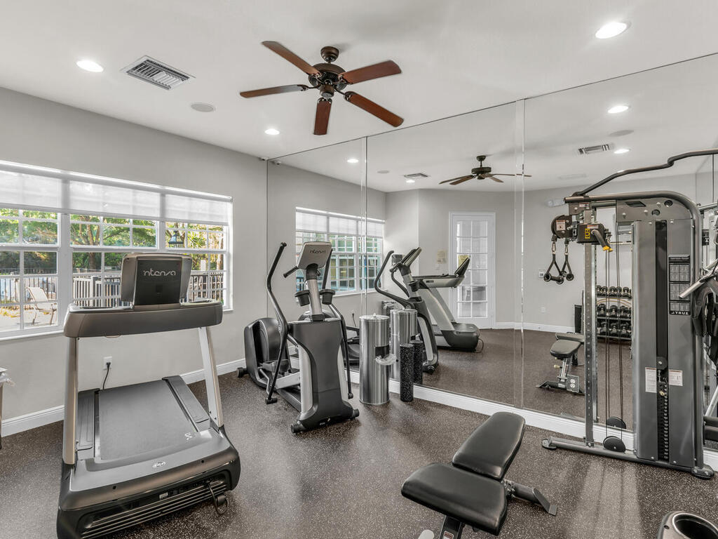 7869 Hawthorne, Unit 303 Naples, FL 34113 - Photo 45 of 52 a view of a room with gym equipment