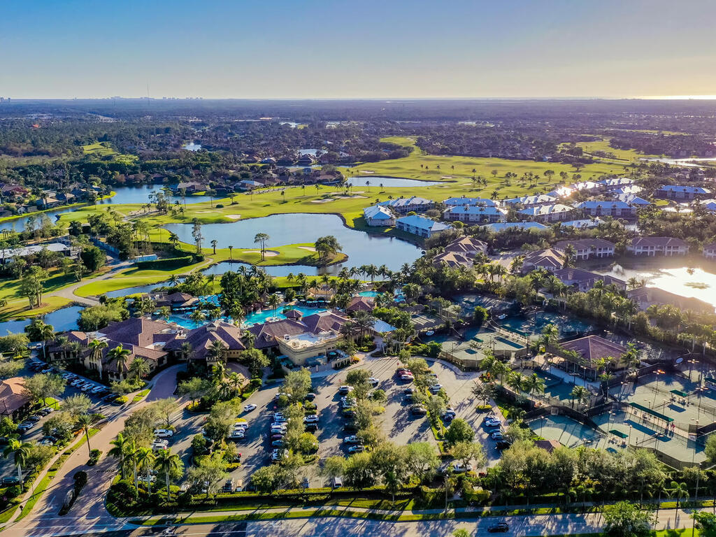 7869 Hawthorne, Unit 303 Naples, FL 34113 - Photo 48 of 52 an aerial view of residential houses with outdoor space
