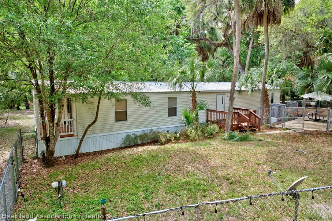 2500 Arbuckle Shrs Road Frostproof, FL 33843 - Photo 1 of 18 a view of a house with backyard