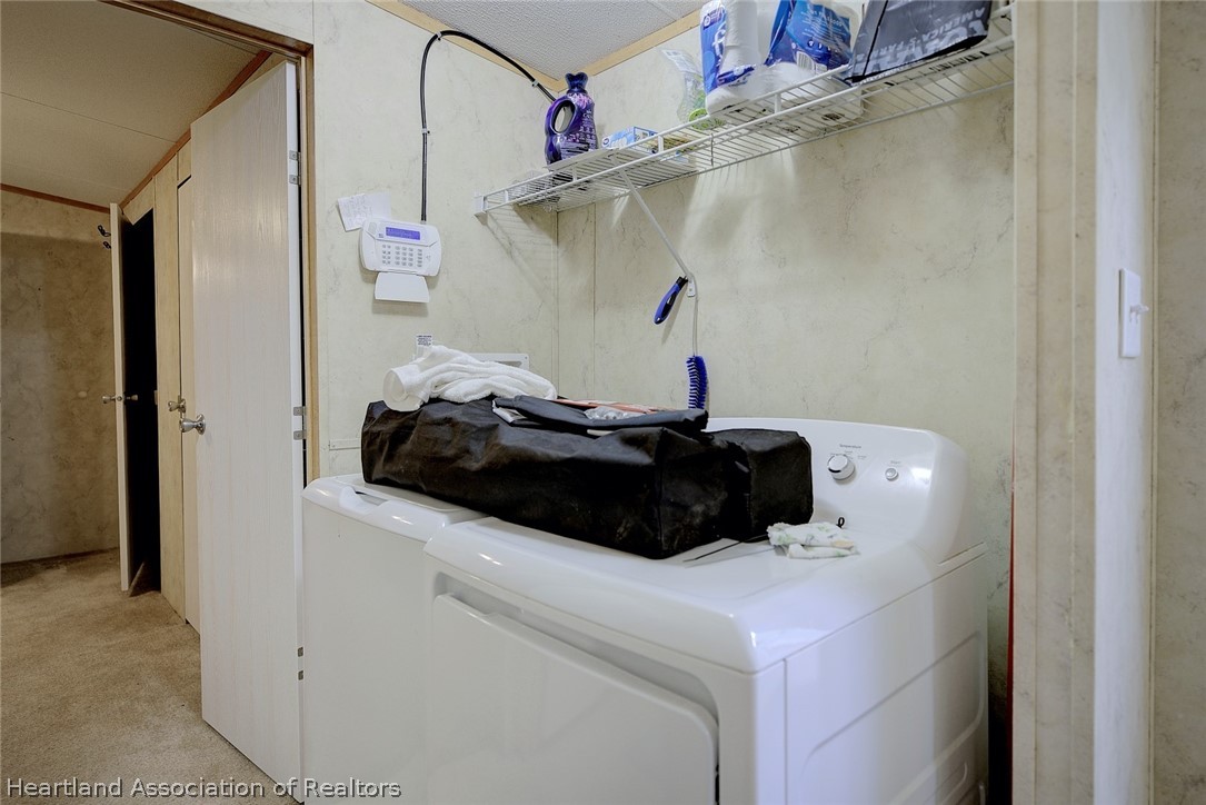 2500 Arbuckle Shrs Road Frostproof, FL 33843 - Photo 11 of 18 a bathroom with a sink and a mirror