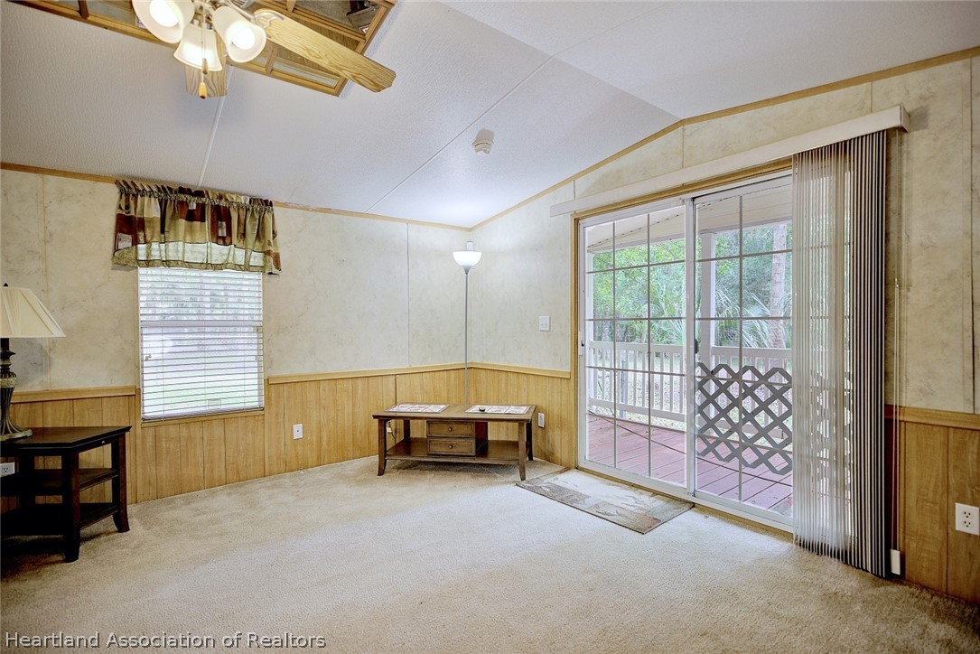 2500 Arbuckle Shrs Road Frostproof, FL 33843 - Photo 16 of 18 a living room with furniture and a window