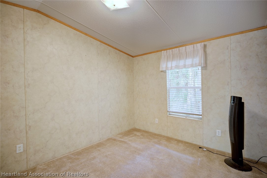 2500 Arbuckle Shrs Road Frostproof, FL 33843 - Photo 10 of 18 an empty room with windows