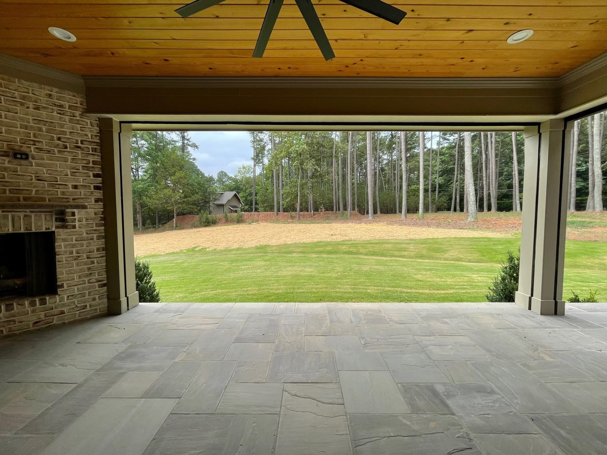 1641 Estate Valley Lane Raleigh, NC 27613 - Photo 4 of 48 Rear Porch with Phantom Screens