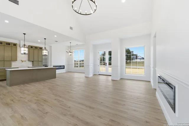 a view of kitchen and windows
