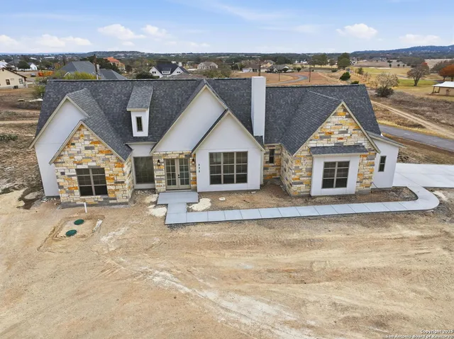 an aerial view of multiple house