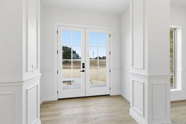 an empty room with windows