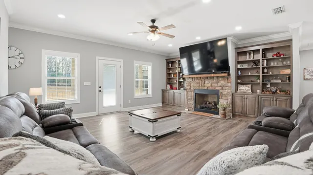 an aerial view of a house with outdoor space