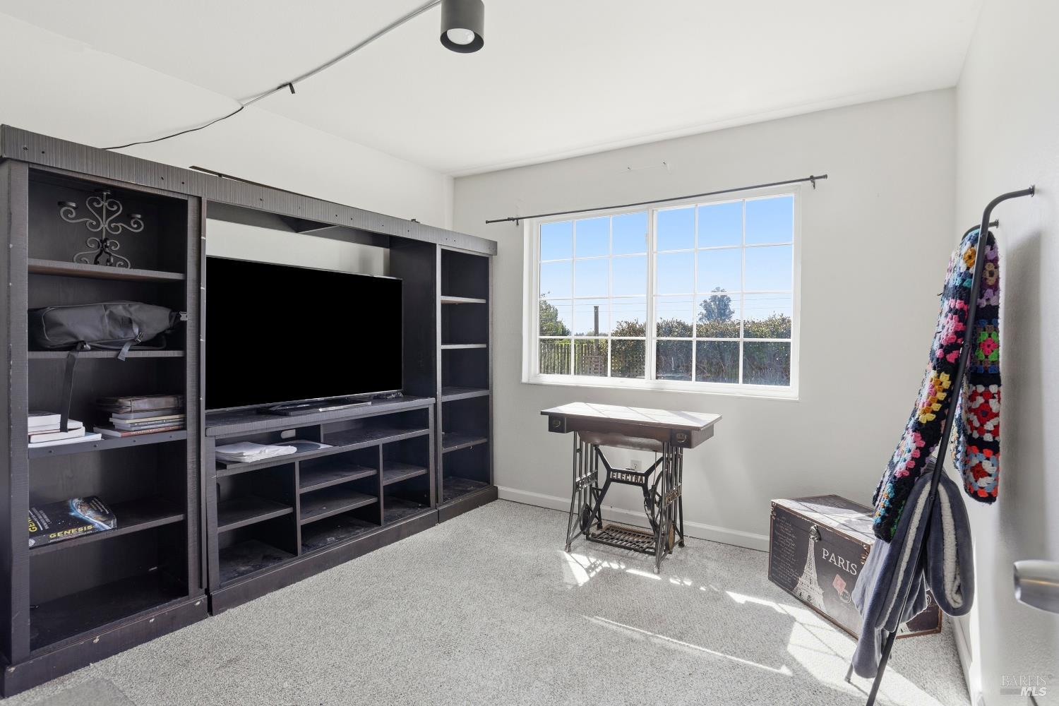 1407 Georgia Court Rohnert Park, CA 94928 - Photo 20 of 36 a view of a livingroom with furniture staircase and a flat screen tv